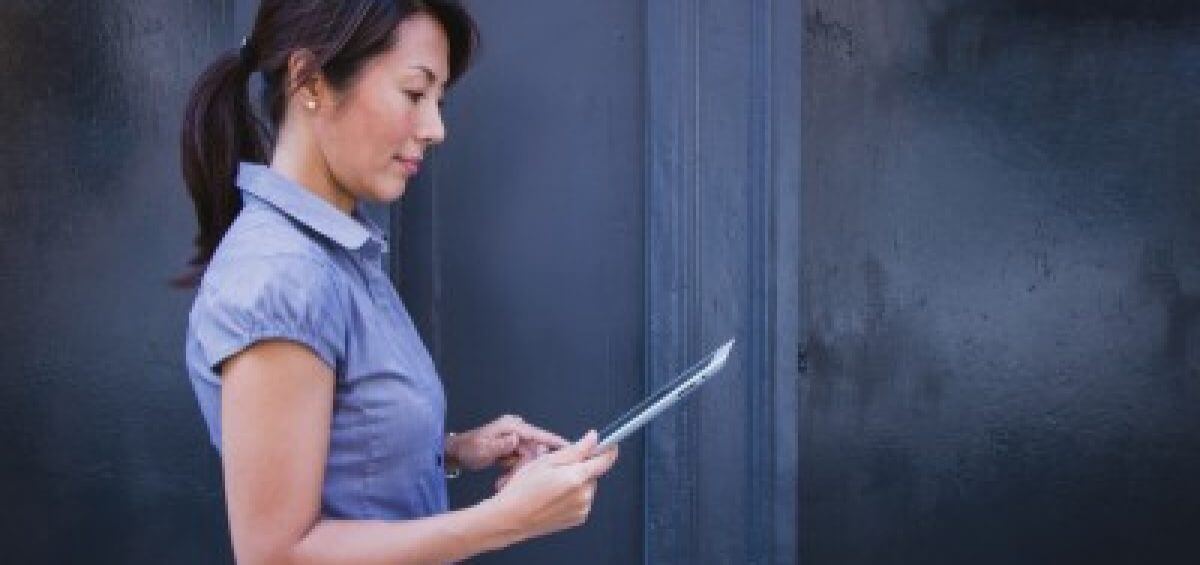 Young woman using her iPad