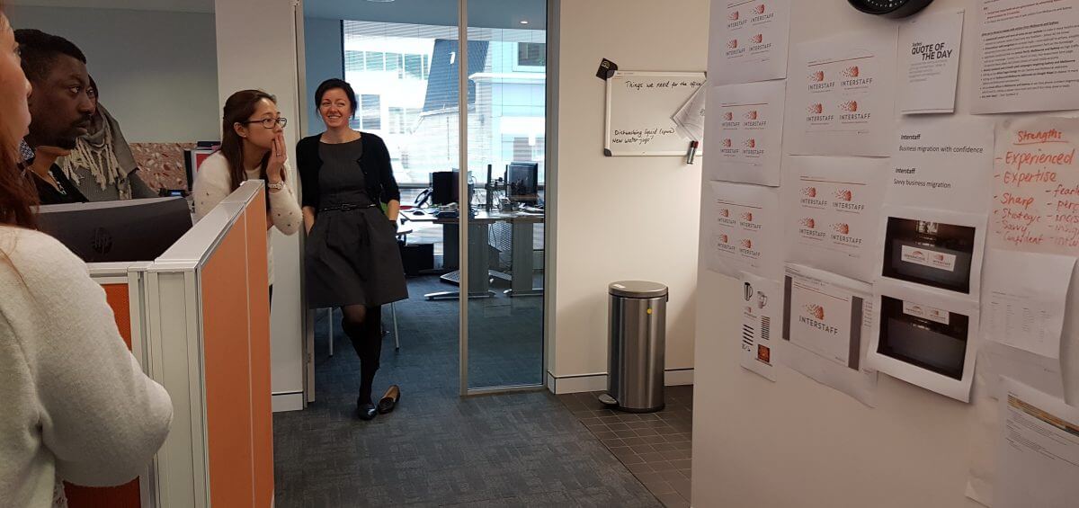 Sheila Woods smiling at the Interstaff team in the HQs