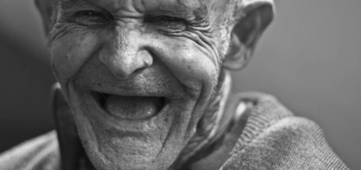 An elderly man full of happiness