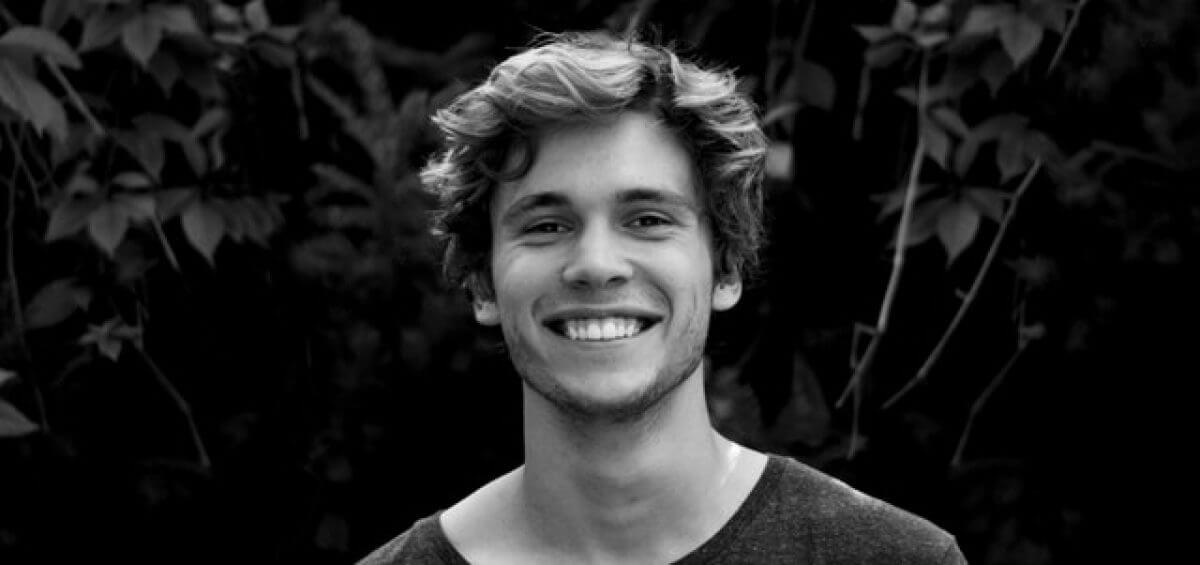 Happy young man smiling