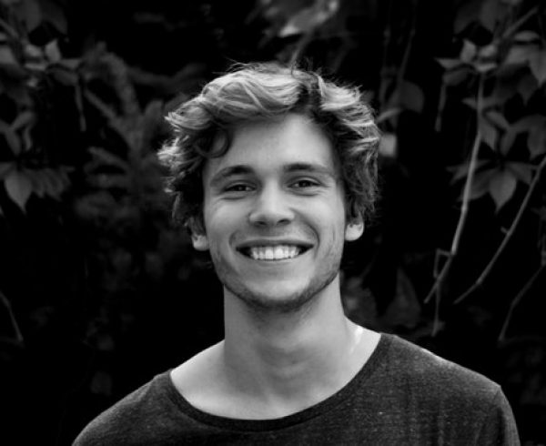 Happy young man smiling