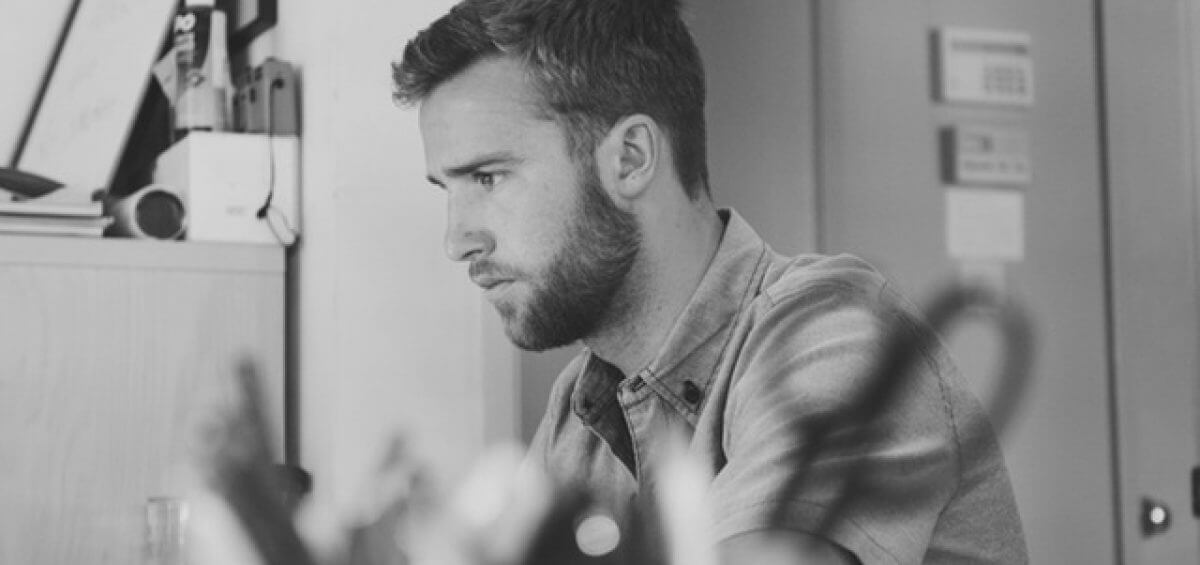 Young man working at his desk