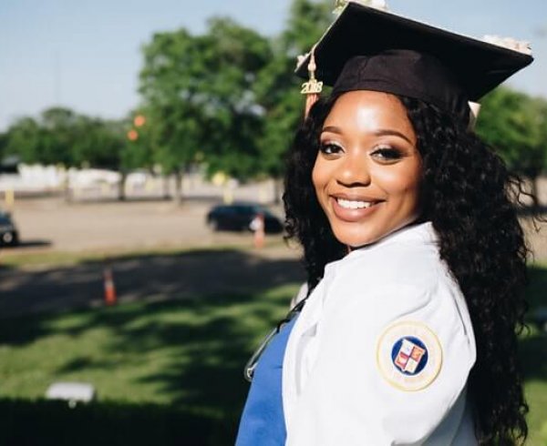 Young woman at graduation thinking of the WA graduate occupation list