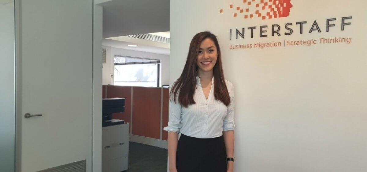 Registered migration agent (MARN: 1808239) Melissa Phan standing in the Interstaff office