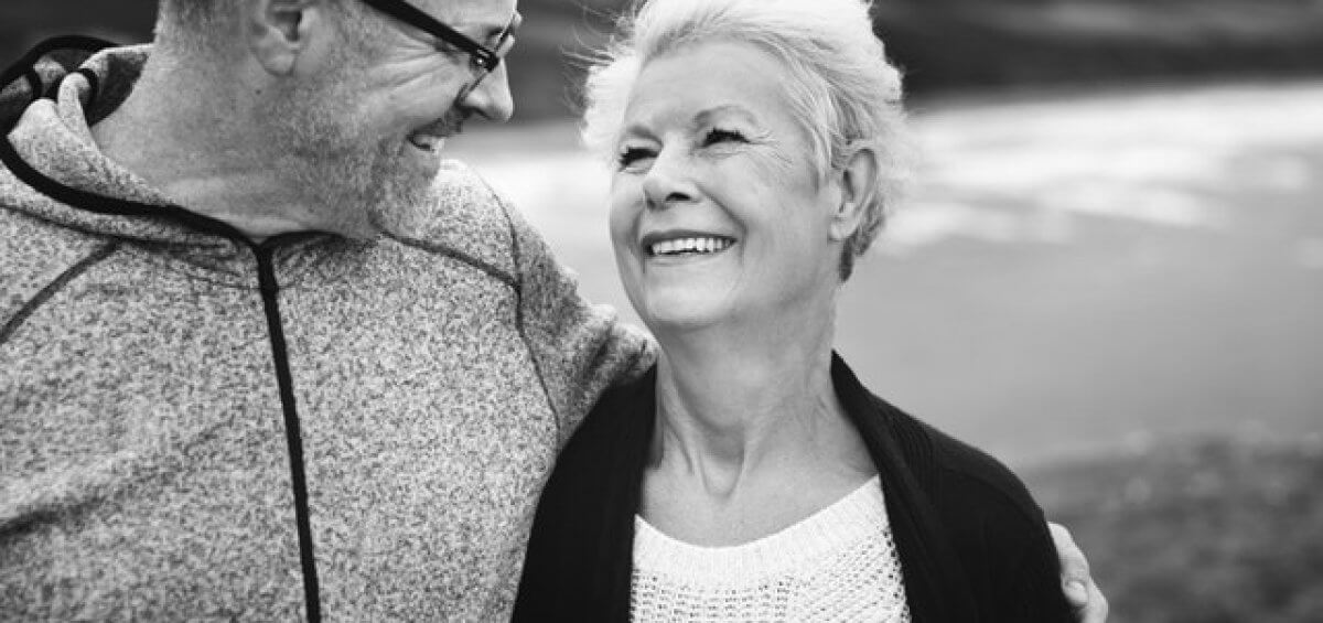 Middle aged couple smiling about the new Temporary Parent visa coming into action on 17 April 2019