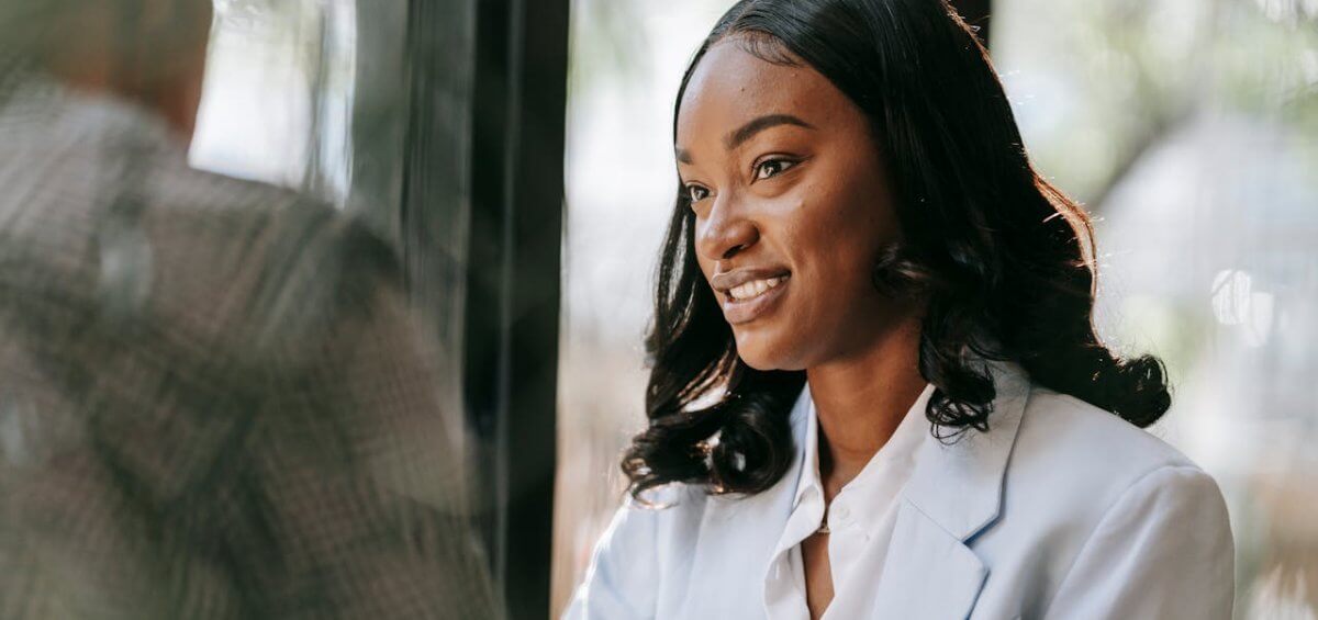 two professionals speaking to each other